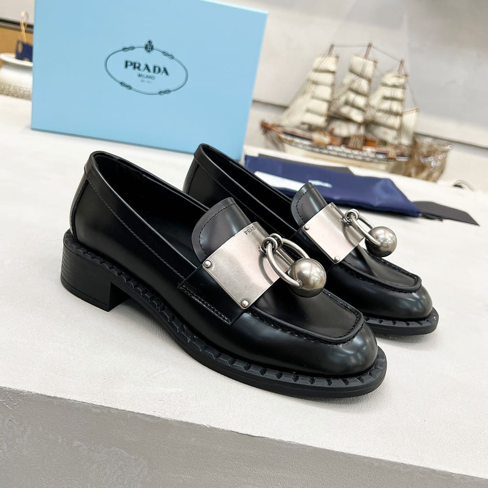 PRADA Brushed leather loafers with metal details